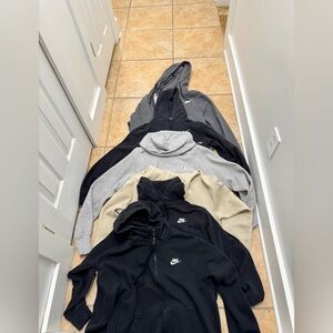 Nike hoodies and one champion hoodie each for $35